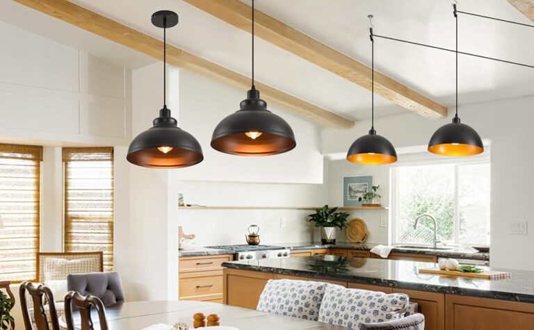 What to Look for in Bronze Pendant Lights for Traditional Spaces pendant-lights-have-a-dome-shape-with-a-matte-black-finish-on-the-exterior