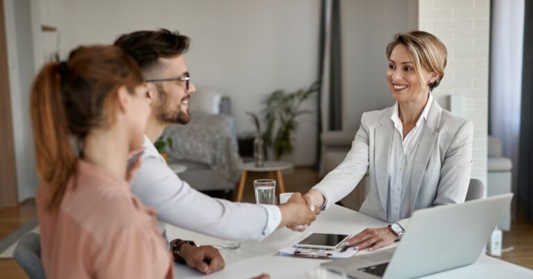 real-estate-agent-is-dealing-with-clients-for-buying-home