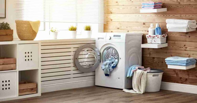 a-front-load-washing-machine-and-dryer-the-space-uses-a-neutral-color-palette