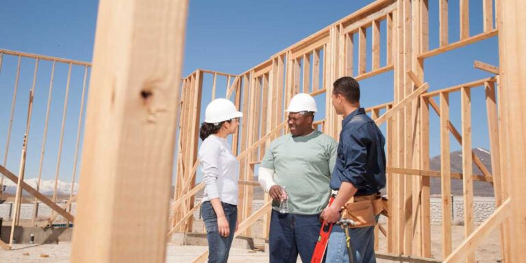 construction-crew-of-three-individual-at-a-residential-building-site