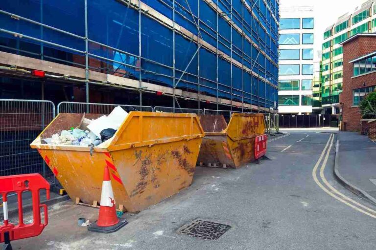 Skip Hire in Brentwood: A Complete Guide for Homeowners and Businesses two-yellow-skips-placed-on-a-city-street-likely-for-a-construction-or-renovation-project