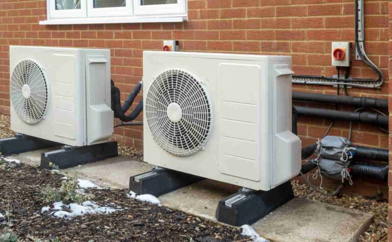 white-rectangular-units-contain-a-fan-and-compressor-essential-for-transferring-heat-between-the-outdoor-air-and-the-home