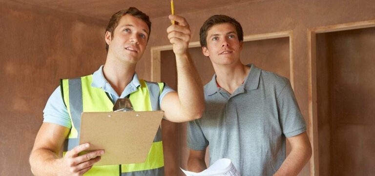 home-inspection-or-construction-project-management-it-features-two-men-in-an-unfinished-interior-space